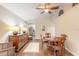 Spacious dining area with hardwood floors and access to kitchen at 4088 Clock Tower Dr, Port Orange, FL 32129