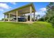 Covered boat storage next to the house at 2075 Country Farms Rd, Port Orange, FL 32128