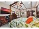 Main bedroom with a king-size bed and walk-in closet at 2075 Country Farms Rd, Port Orange, FL 32128