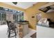 Outdoor kitchen features a built-in grill and bar at 2075 Country Farms Rd, Port Orange, FL 32128
