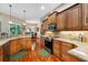 Updated kitchen with granite countertops, stainless steel appliances, and wood cabinets at 2075 Country Farms Rd, Port Orange, FL 32128