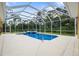 Relaxing screened pool and spa, perfect for outdoor entertaining at 2075 Country Farms Rd, Port Orange, FL 32128