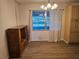 Dining room with wood-look floors at 401 Cherry St, South Daytona, FL 32119