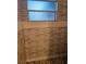 Shower with stone-look tile surround and pebble floor at 401 Cherry St, South Daytona, FL 32119