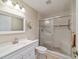 Clean bathroom with walk-in shower and white vanity at 1106 Carvello Dr, The Villages, FL 32162
