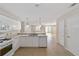 Clean and bright kitchen with white cabinets at 1106 Carvello Dr, The Villages, FL 32162