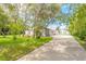 Image 1 of 60: 5803 Spruce Creek Woods Dr, Port Orange