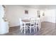 Bright dining area with a wooden table and white chairs at 3171 Utah Dr, Deltona, FL 32738