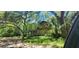 Two-story home with mature trees and landscaping at 711 Sunset Ave, Orange City, FL 32763