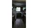 Simple kitchen with white appliances at 711 Sunset Ave, Orange City, FL 32763
