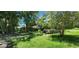 Overgrown lot with scattered debris and lush vegetation at 711 Sunset Ave, Orange City, FL 32763
