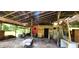 Interior of a neglected outbuilding at 711 Sunset Ave, Orange City, FL 32763