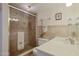 Clean bathroom with a walk-in shower and white vanity at 4435 S Atlantic Ave # 414, Ponce Inlet, FL 32127