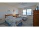 Bedroom with twin beds, ocean view, and nautical-themed bedding at 4435 S Atlantic Ave # 414, Ponce Inlet, FL 32127