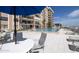 Relaxing pool area with patio furniture and beach umbrellas at 4435 S Atlantic Ave # 414, Ponce Inlet, FL 32127