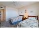 Bedroom with twin beds, nautical bedding, and built-in closet at 4435 S Atlantic Ave # 414, Ponce Inlet, FL 32127
