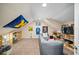 Multipurpose bonus room with built-in shelving and a comfortable couch at 112 S Chandler Ave, Deland, FL 32724