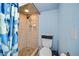 Updated bathroom with a shower and tile surround at 112 S Chandler Ave, Deland, FL 32724