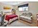 Cozy bedroom with double bed, sofa, and built-in shelving at 600 N Boundary Ave # 101A, Deland, FL 32720