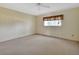 Large bedroom with carpeted floors and ceiling fan at 600 N Boundary Ave # 101A, Deland, FL 32720