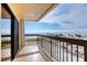 Spacious balcony boasting stunning ocean views and a relaxing seating area at 1513 Ocean Shore Blvd # 3C, Ormond Beach, FL 32176