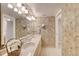 Double vanity bathroom with updated fixtures at 1513 Ocean Shore Blvd # 3C, Ormond Beach, FL 32176
