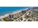 Coastal aerial view showcasing a beachfront property at 1513 Ocean Shore Blvd # 3C, Ormond Beach, FL 32176