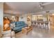 Open concept living room with kitchen and breakfast bar at 1513 Ocean Shore Blvd # 3C, Ormond Beach, FL 32176