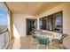 Private balcony with ocean view and seating at 1513 Ocean Shore Blvd # 3C, Ormond Beach, FL 32176