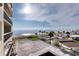 Aerial view showcasing oceanfront location and parking at 1513 Ocean Shore Blvd # 3C, Ormond Beach, FL 32176