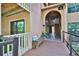 Inviting building entrance with a comfortable bench at 1401 S Palmetto Ave # 402, Daytona Beach, FL 32114
