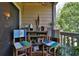 Charming patio featuring colorful seating and lush greenery at 1401 S Palmetto Ave # 402, Daytona Beach, FL 32114