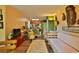 Open living space showcasing bamboo furniture and kitchen at 1401 S Palmetto Ave # 402, Daytona Beach, FL 32114