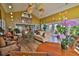 Bright and airy community room with hardwood floors and comfortable seating at 1401 S Palmetto Ave # 402, Daytona Beach, FL 32114