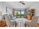 Bright living room with ocean views and comfy seating at 4175 S Atlantic Ave # 1130, New Smyrna Beach, FL 32169