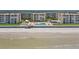 Oceanfront building with beach access and a pool area at 4175 S Atlantic Ave # 1130, New Smyrna Beach, FL 32169
