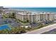 Aerial view of oceanfront condos and tennis court at 4175 S Atlantic Ave # 1130, New Smyrna Beach, FL 32169