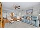 Spacious living room with light-colored furniture and ocean view at 4175 S Atlantic Ave # 1130, New Smyrna Beach, FL 32169