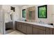 Bathroom with double vanity and marble countertops at 200 John Anderson Dr, Ormond Beach, FL 32176