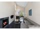 Open living area with a fireplace and comfortable seating at 200 John Anderson Dr, Ormond Beach, FL 32176