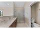 Modern bathroom with marble vanity and walk-in shower at 200 John Anderson Dr, Ormond Beach, FL 32176