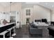 Spacious living room features a fireplace, large windows, and ample seating at 200 John Anderson Dr, Ormond Beach, FL 32176