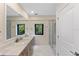 Modern bathroom with marble vanity and walk-in shower at 200 John Anderson Dr, Ormond Beach, FL 32176