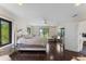 Main bedroom with dark hardwood floors and water views at 200 John Anderson Dr, Ormond Beach, FL 32176