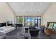 High-ceiling living room with water views and plenty of natural light at 200 John Anderson Dr, Ormond Beach, FL 32176