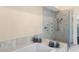 Spa-like bathroom with marble shower and soaking tub at 200 John Anderson Dr, Ormond Beach, FL 32176
