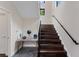 Modern staircase with dark wood and metal railing at 200 John Anderson Dr, Ormond Beach, FL 32176