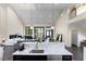 Open concept kitchen and living area with high ceilings and large windows at 200 John Anderson Dr, Ormond Beach, FL 32176
