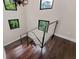 Modern staircase with glass and metal railings at 200 John Anderson Dr, Ormond Beach, FL 32176