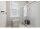 Clean bathroom with a walk-in shower and updated fixtures at 1117 Athlone Way, Ormond Beach, FL 32174